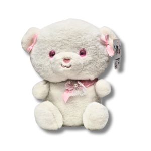 white teddy bear with pink eyes